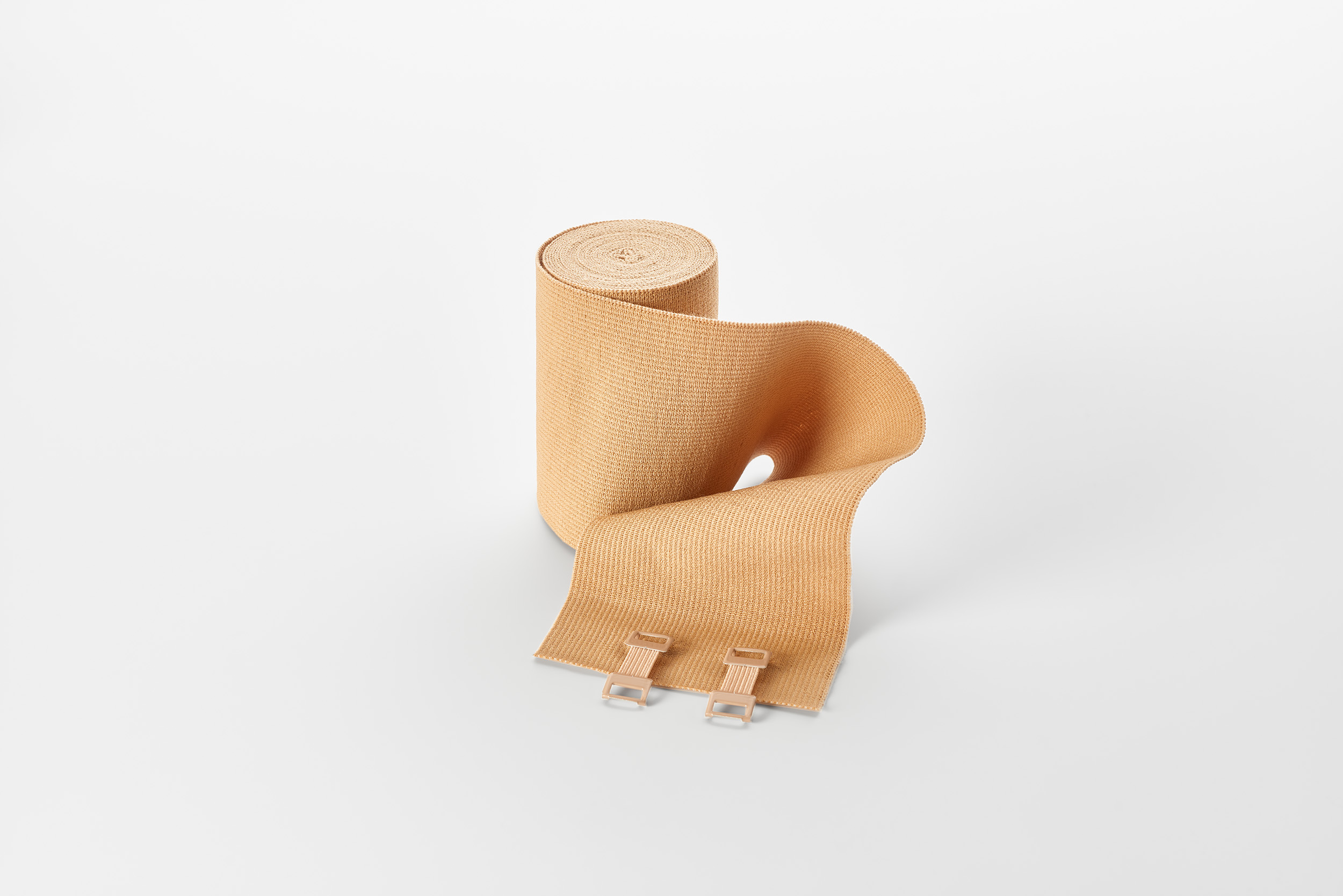 praxi-longelast, elastische, beige feine Langzugbinde, ca. 170% Dehnung